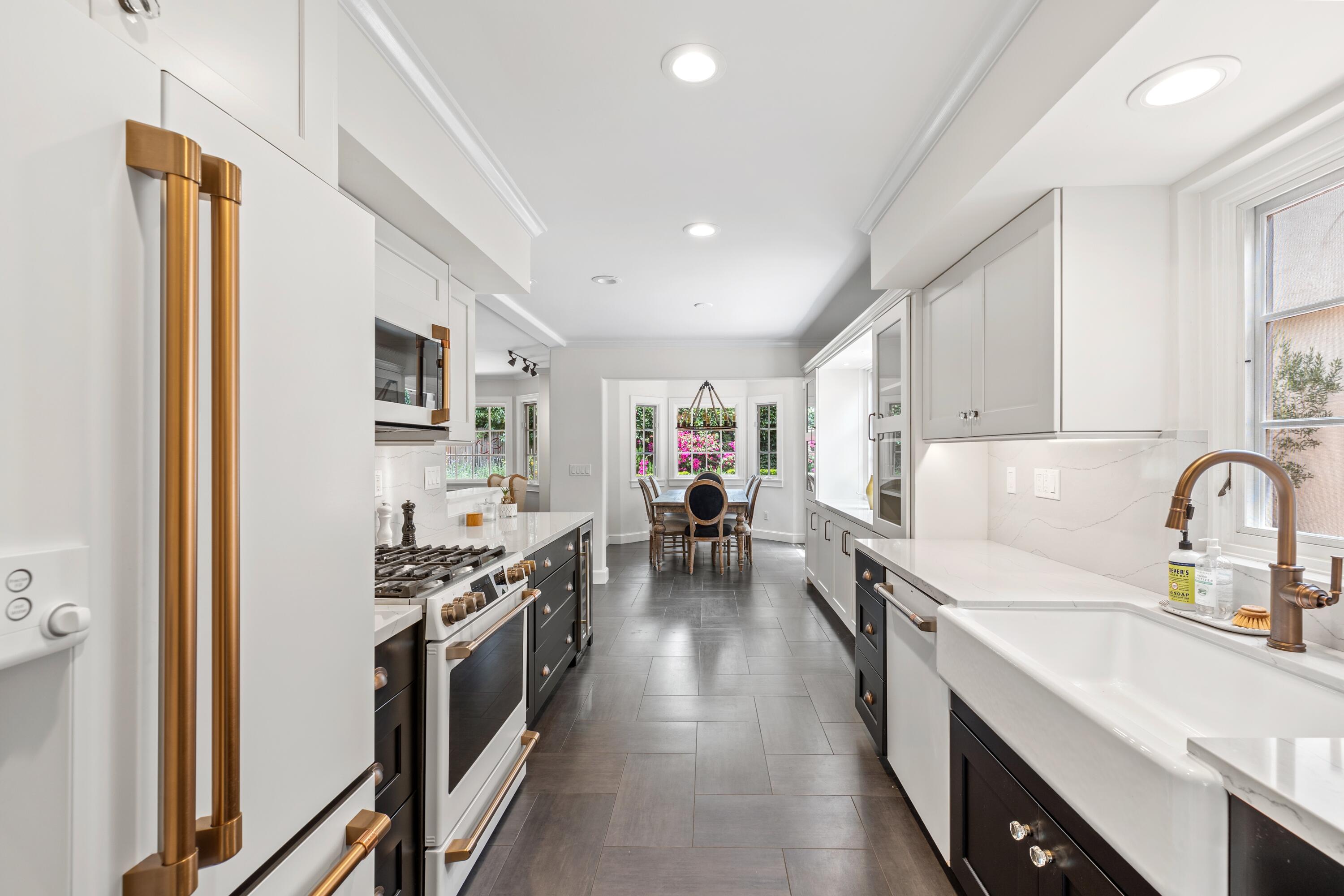 1284 Spring Road Santa Barbara, CA 93108 - Photo 6 of 33 a kitchen with stainless steel appliances a sink stove and refrigerator