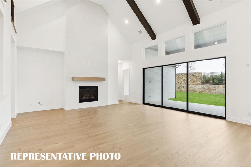 4051 Gambel Road Prosper, TX 75078 - Photo 4 of 20 Featuring a full wall slider, it's easy to take the party outdoors in this dream home! REPRESENTATIVE PHOTO