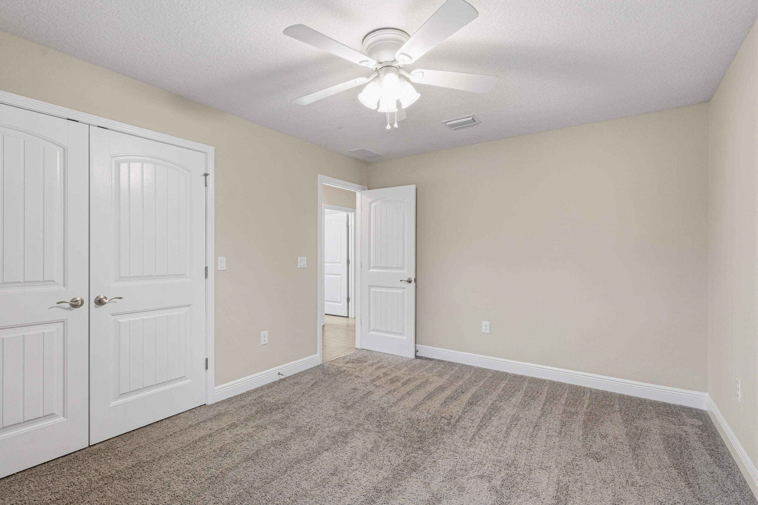 2345 Genevieve Way Crestview, FL 32536 - Photo 16 of 41 wooden floor in an empty room