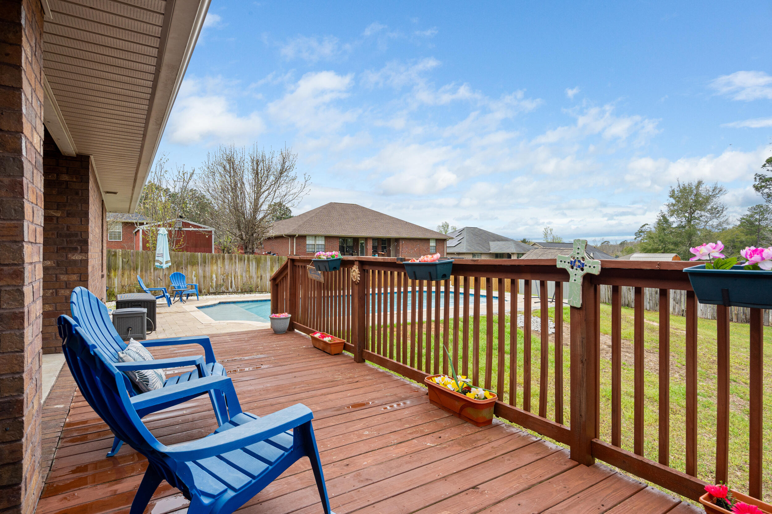 2345 Genevieve Way Crestview, FL 32536 - Photo 31 of 41 a view of balcony with wooden floor and outdoor seating