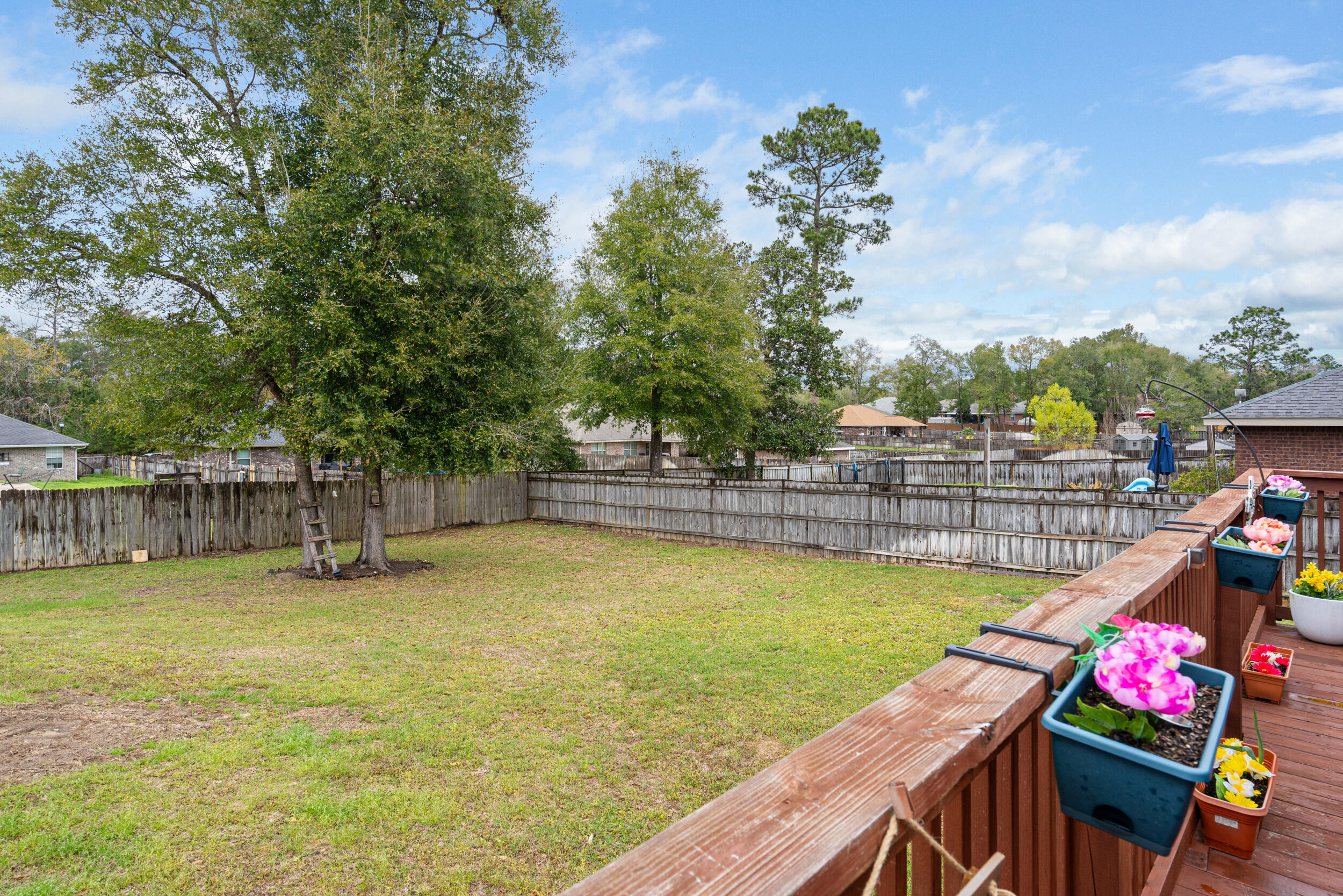 2345 Genevieve Way Crestview, FL 32536 - Photo 32 of 41 a view of a swimming pool with lounge chairs