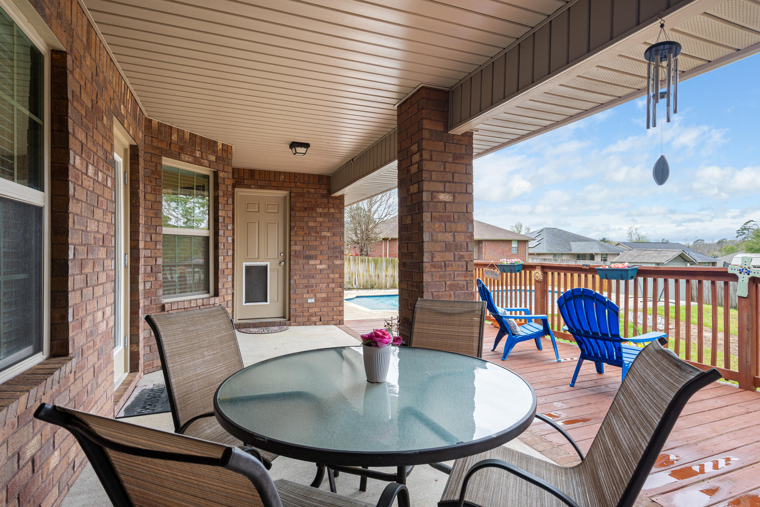 2345 Genevieve Way Crestview, FL 32536 - Photo 36 of 41 a dining room with furniture a rug and a large window