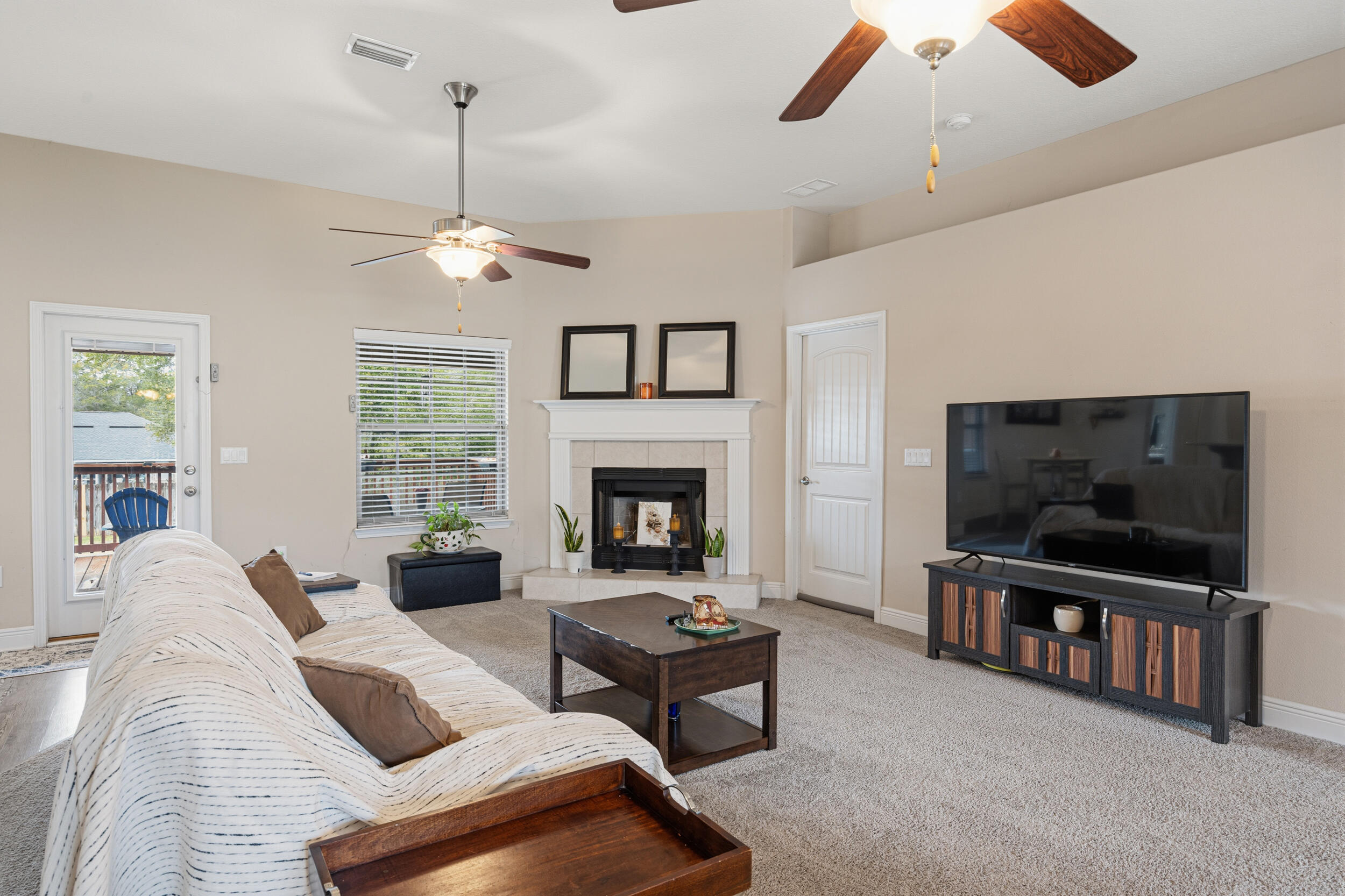 2345 Genevieve Way Crestview, FL 32536 - Photo 5 of 41 a living room with furniture and a flat screen tv