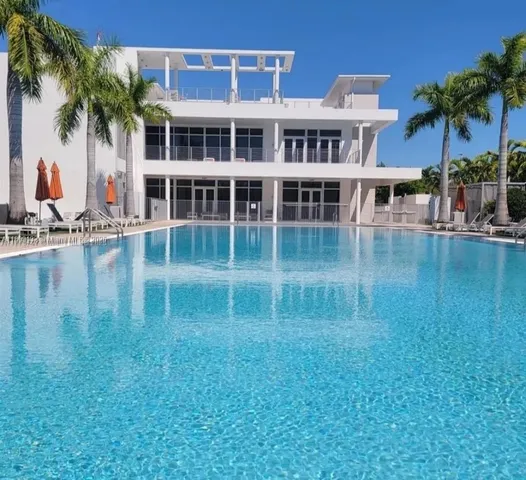 swimming pool with outdoor seating
