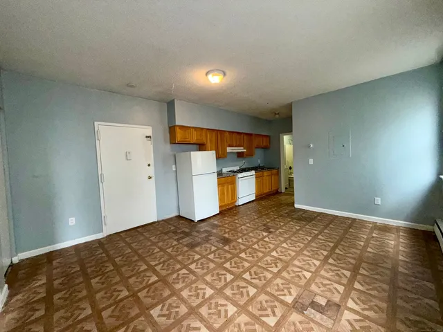 a view of a kitchen with a sink