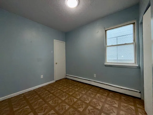 a view of a room with a window