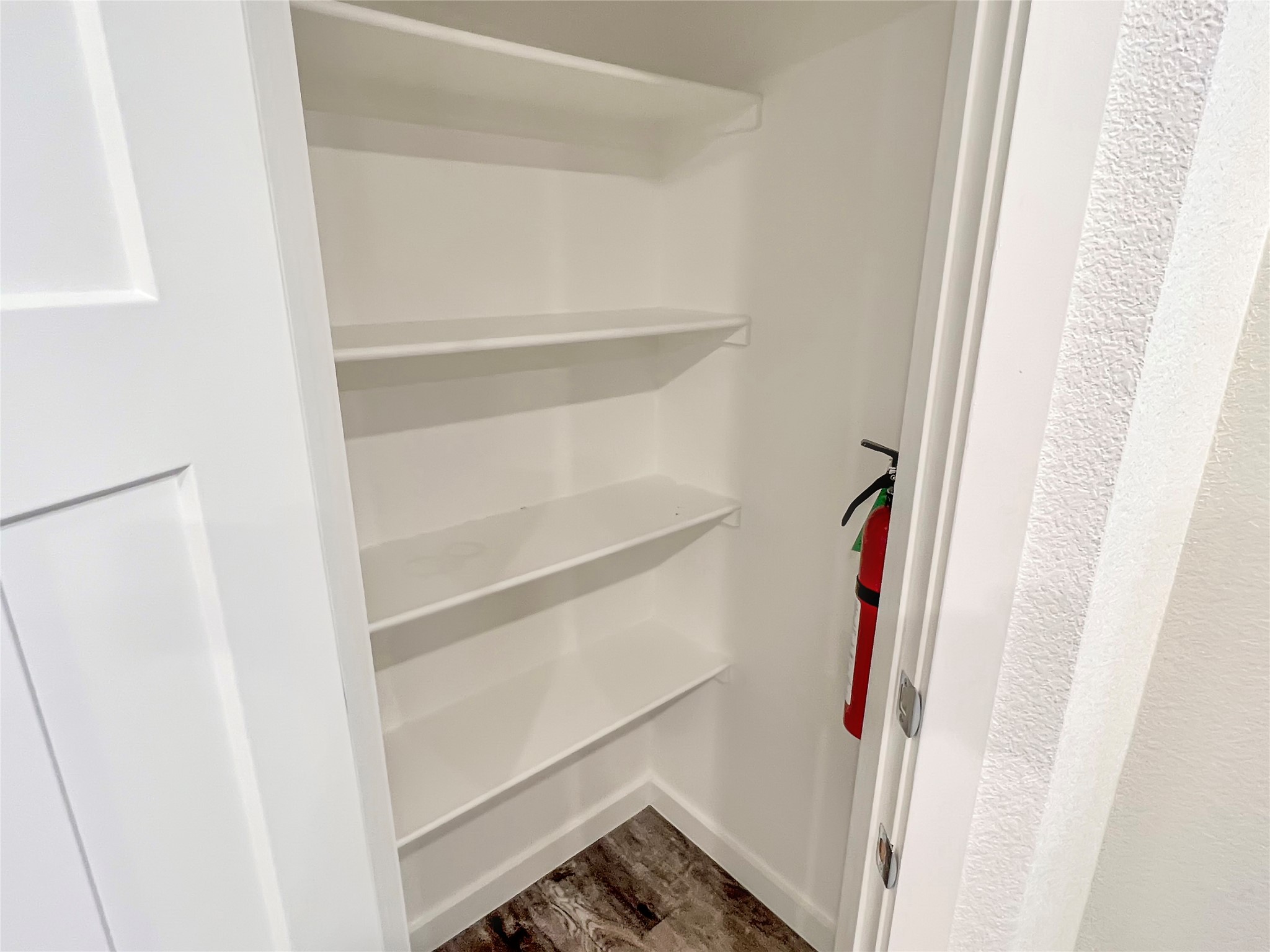 21155 Gosling Road, Unit 48 AD Spring, TX 77388 - Photo 12 of 20 a view of walk in closet with clothes