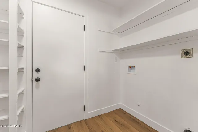 a view of small space with wooden floor