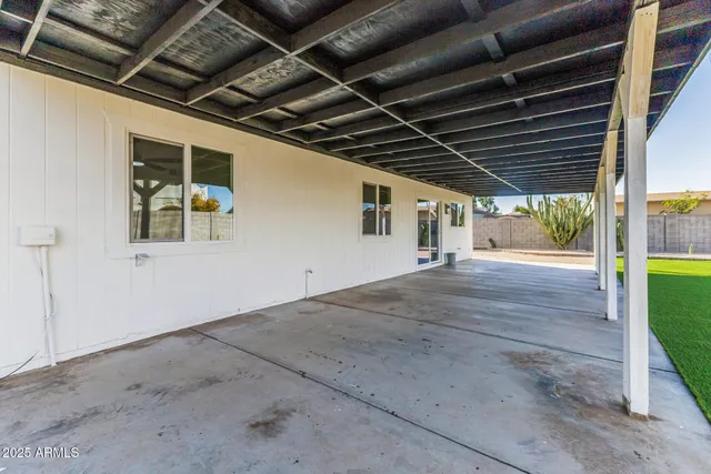 a view of a room with wooden walls