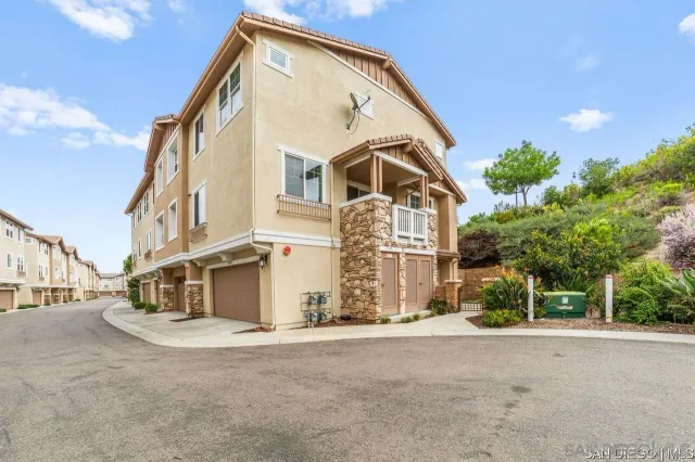 a view of a house with a street