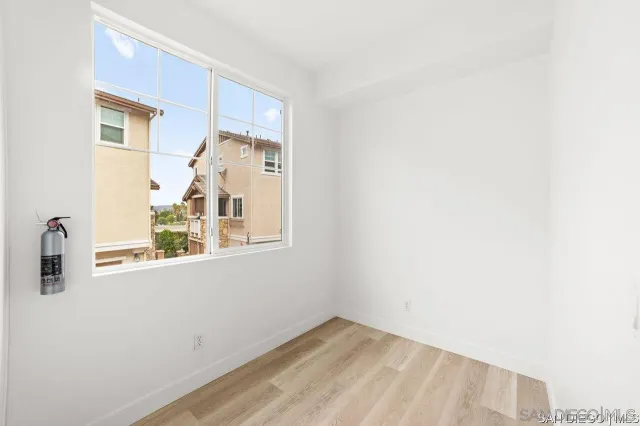 a view of a living room with a window