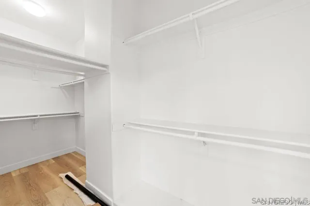 a view of a room with racks on the wall