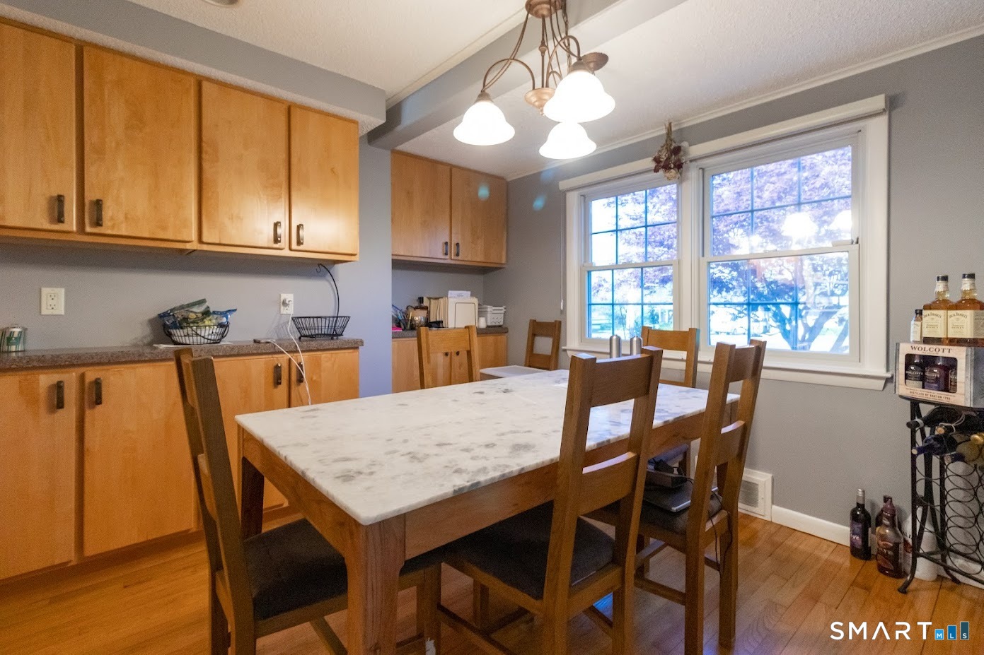 763 North Street Suffield, CT 06078 - Photo 7 of 40 a view of a dining room with furniture window and wooden floor