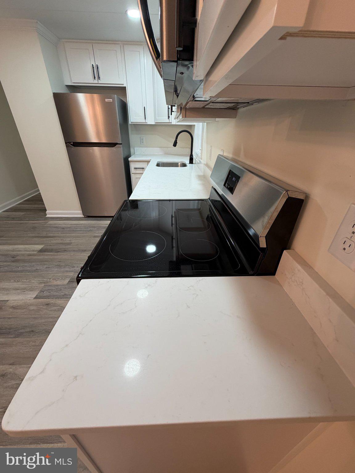22206 Wetipquin Road Quantico, MD 21856 - Photo 11 of 19 Modern kitchen with sleek finishes.