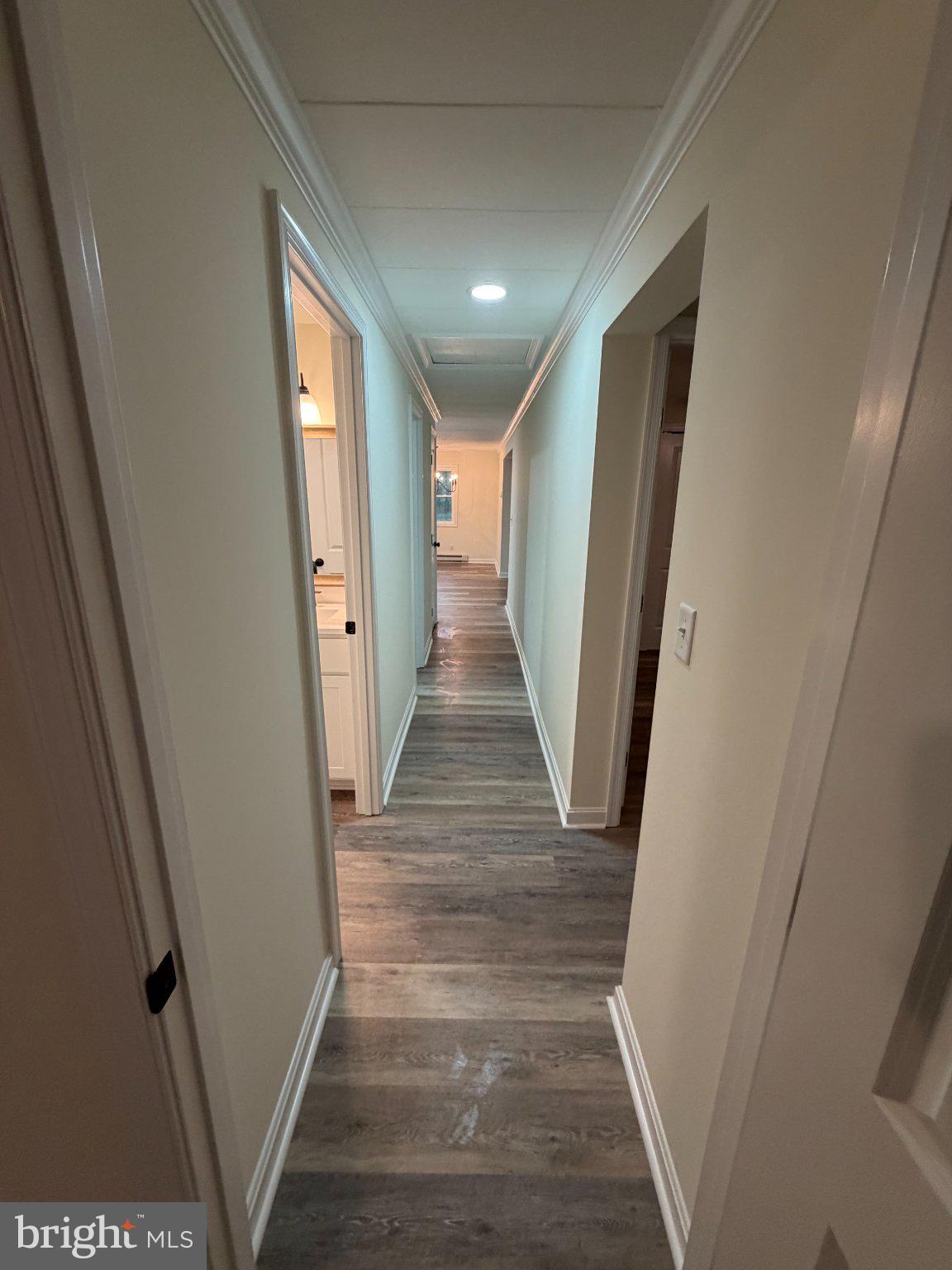 22206 Wetipquin Road Quantico, MD 21856 - Photo 15 of 19 Inviting hallway with modern charm.