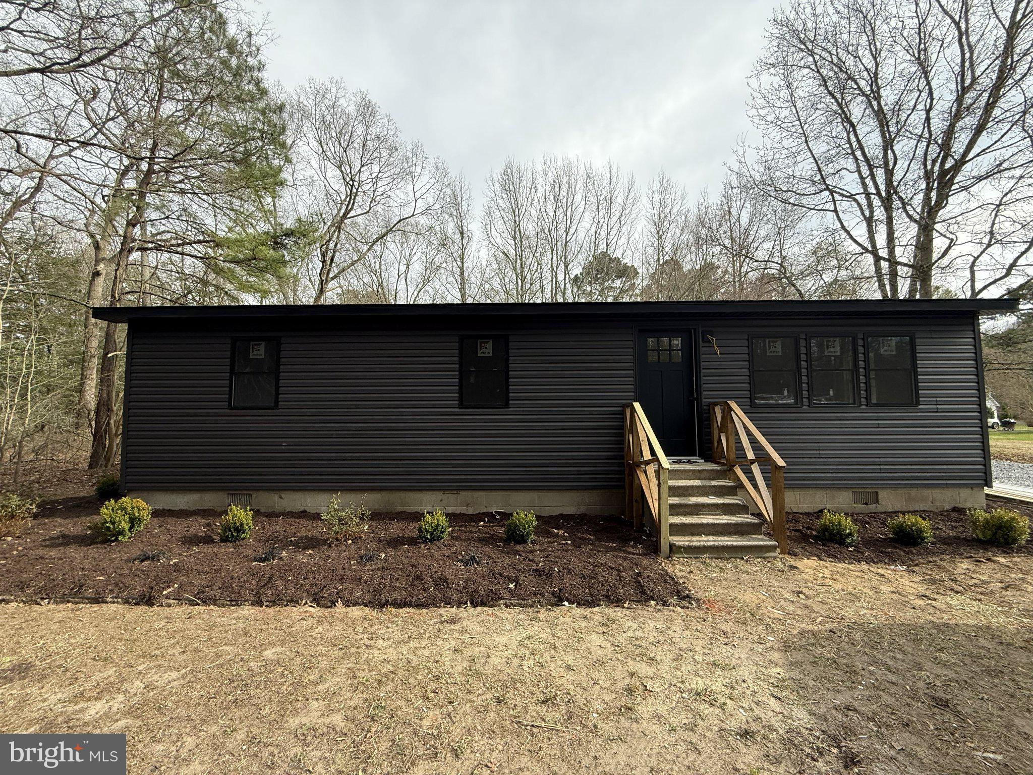 22206 Wetipquin Road Quantico, MD 21856 - Photo 2 of 19 Modern charm in a serene setting.