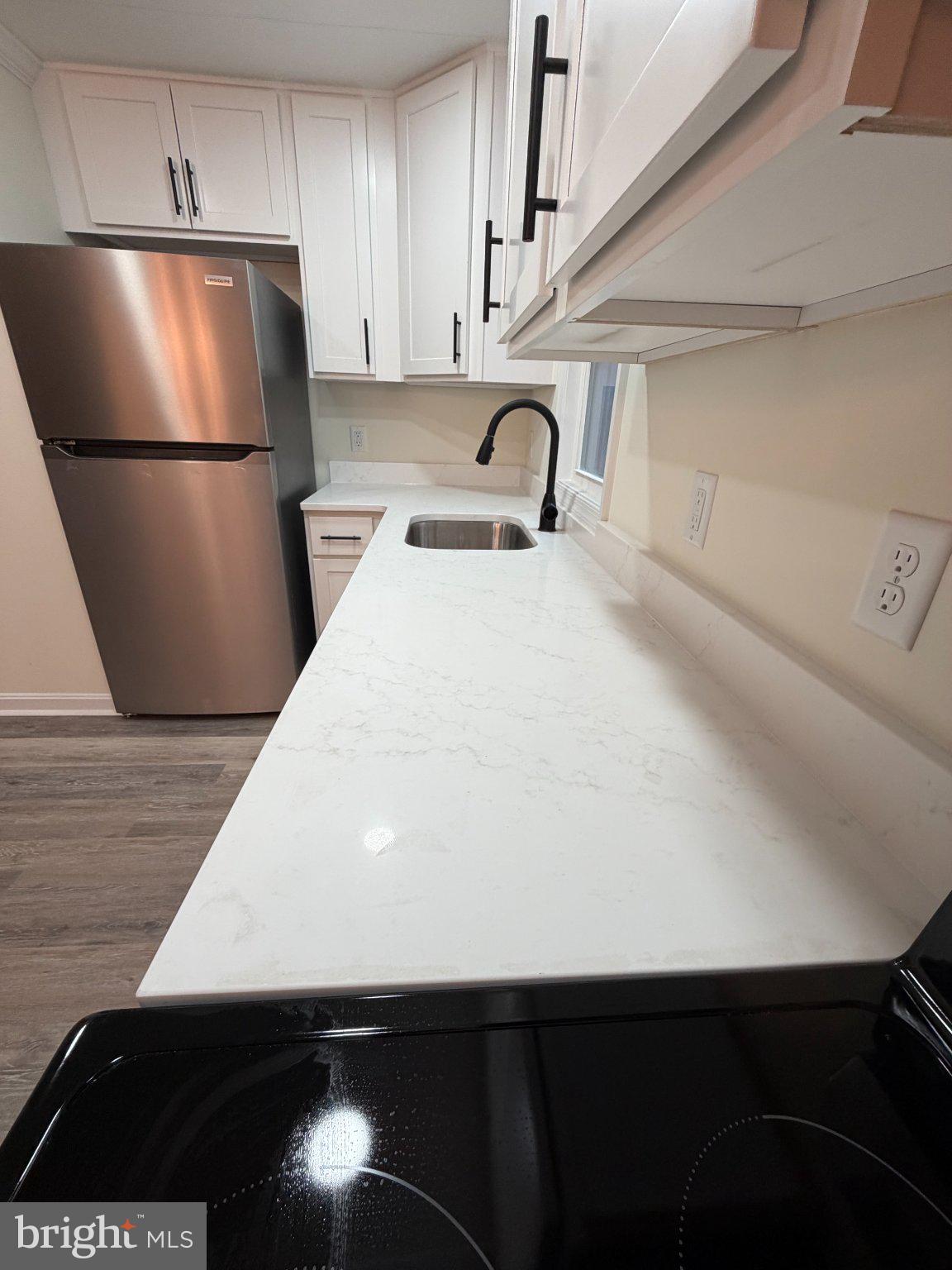 22206 Wetipquin Road Quantico, MD 21856 - Photo 10 of 19 Sleek modern kitchen with elegance.