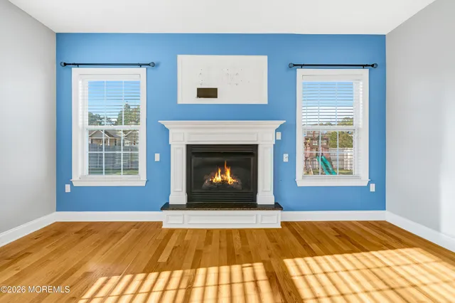 a view of entryway with wooden floor