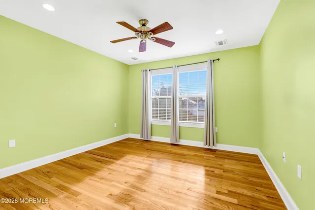 a bathroom with a shower and a toilet