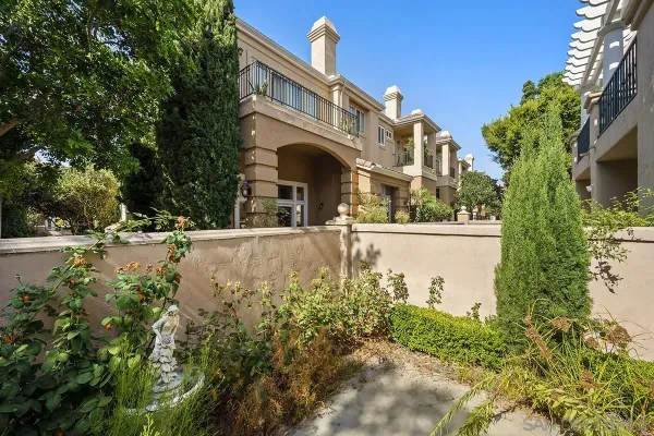 a view of building with tree s
