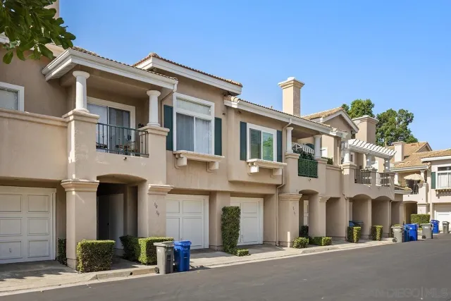 a view of a building with a street