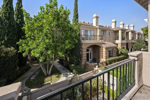 a view of a building from a balcony