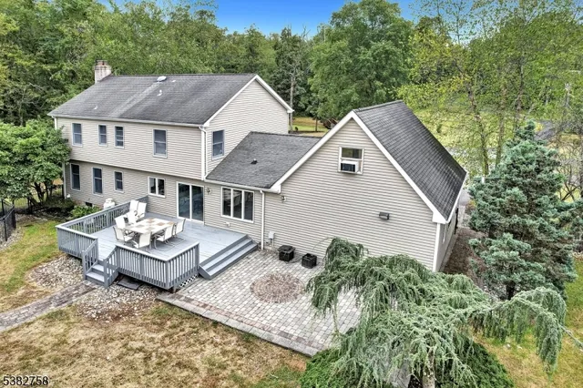 a aerial view of a house with a yard