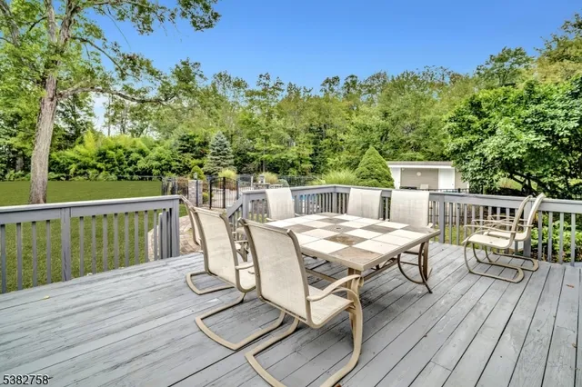 a view of a balcony with chairs