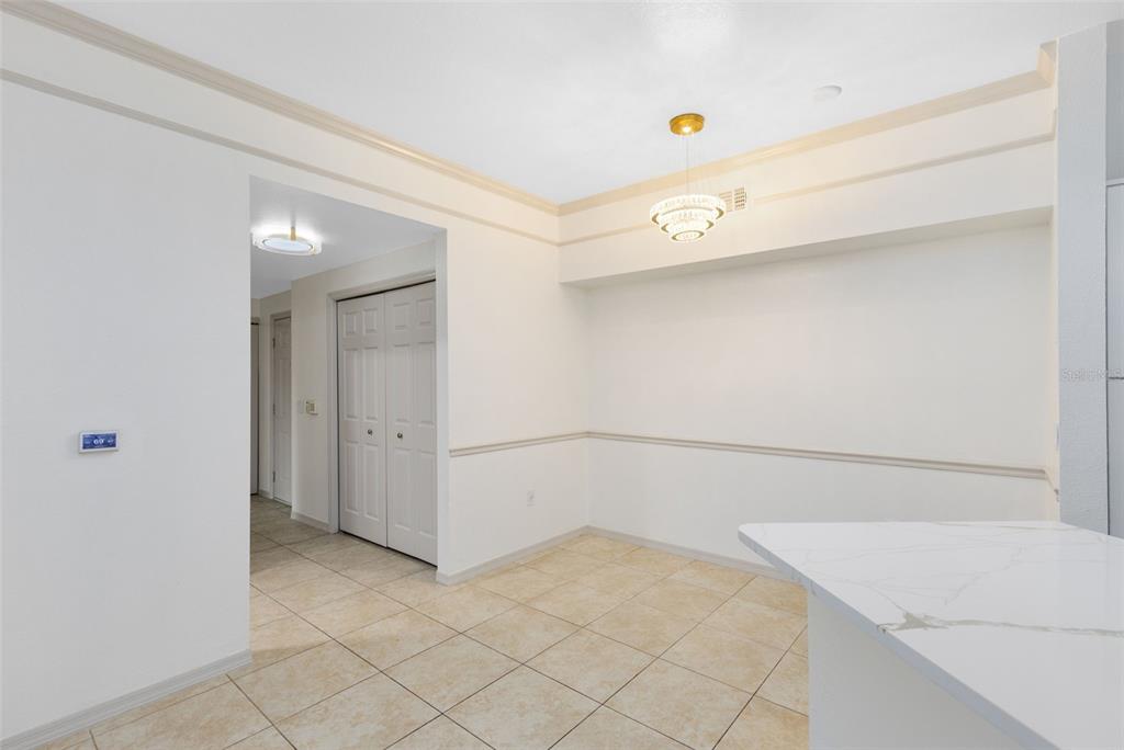 3315 Parkchester Square Boulevard, Unit 102 Orlando, FL 32835 - Photo 12 of 37 a view of storage and utility room with closet