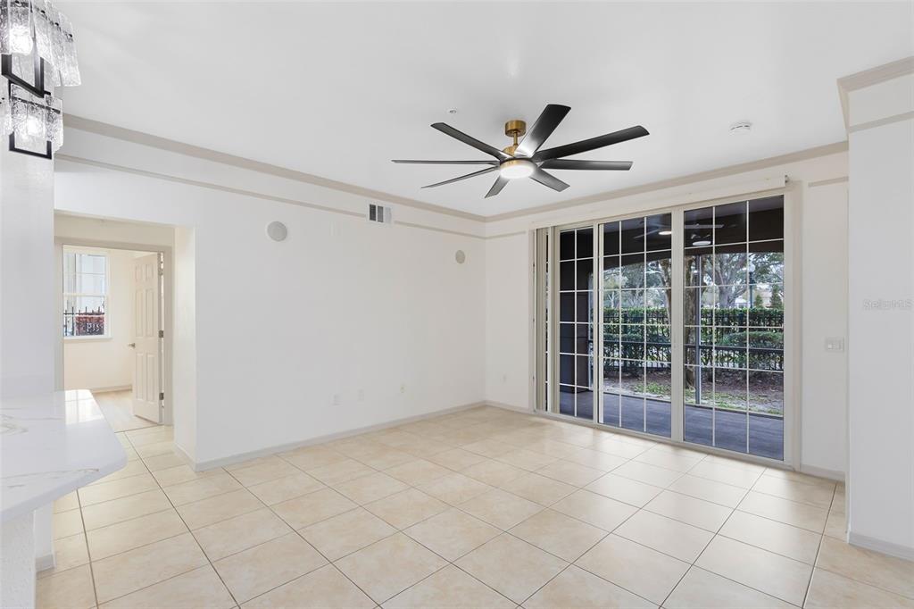 3315 Parkchester Square Boulevard, Unit 102 Orlando, FL 32835 - Photo 13 of 37 en empty room with white walls and windows