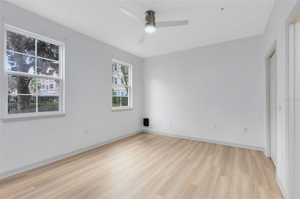 3315 Parkchester Square Boulevard, Unit 102 Orlando, FL 32835 - Photo 15 of 37 a view of an empty room with a window