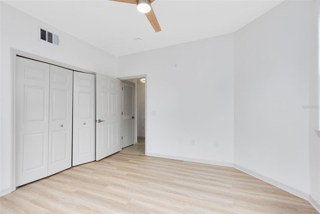 3315 Parkchester Square Boulevard, Unit 102 Orlando, FL 32835 - Photo 23 of 37 a view of an empty room