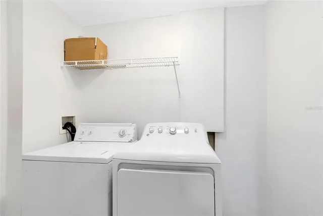 a utility room with dryer and washer