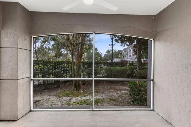 an aerial view of multiple houses with yard