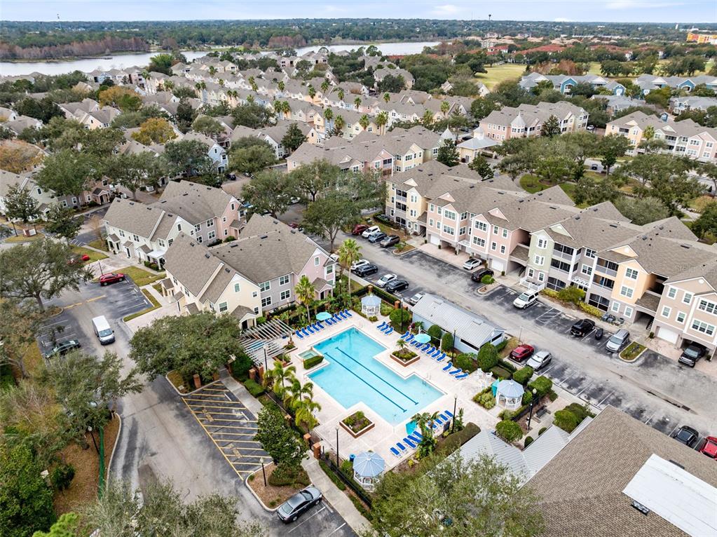 3315 Parkchester Square Boulevard, Unit 102 Orlando, FL 32835 - Photo 31 of 37 an aerial view of residential houses with outdoor space