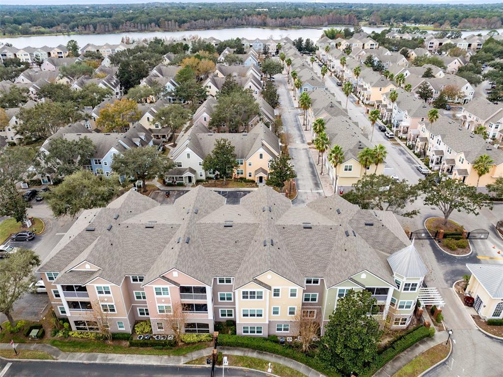 3315 Parkchester Square Boulevard, Unit 102 Orlando, FL 32835 - Photo 36 of 37 an aerial view of residential houses with outdoor space