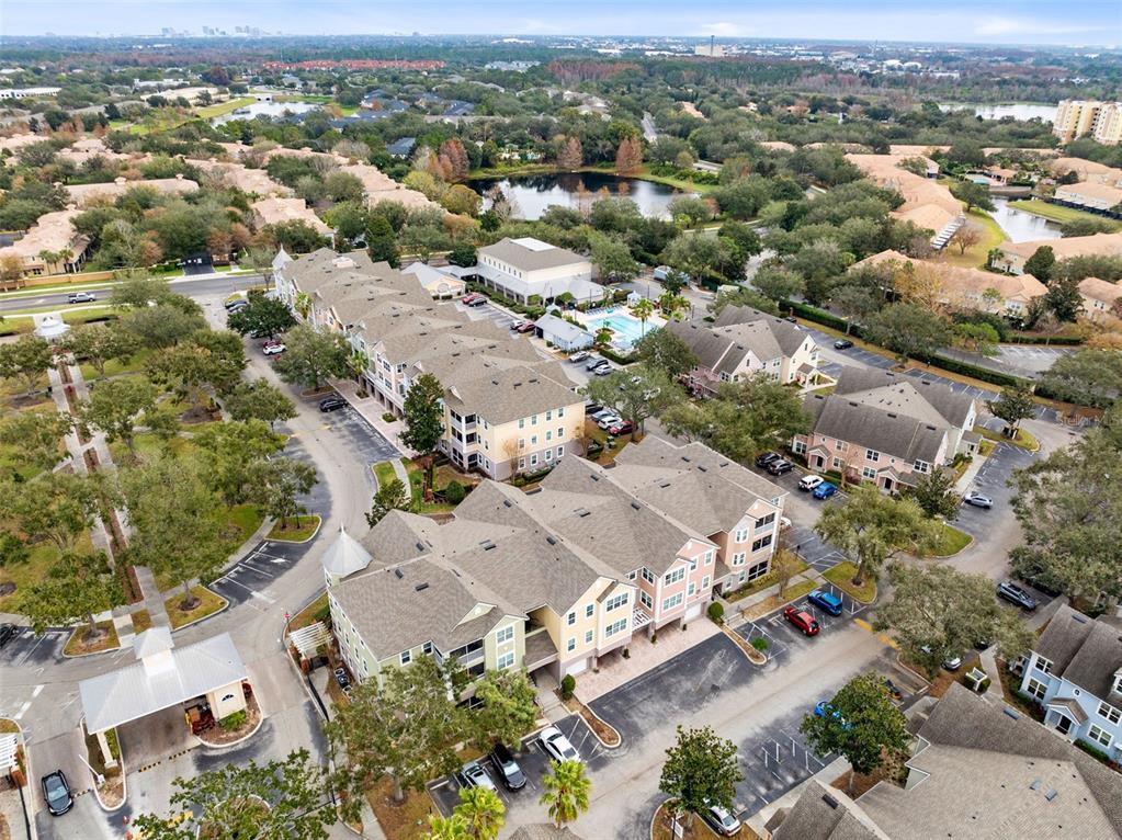 3315 Parkchester Square Boulevard, Unit 102 Orlando, FL 32835 - Photo 37 of 37 an aerial view of a city with lots of residential buildings