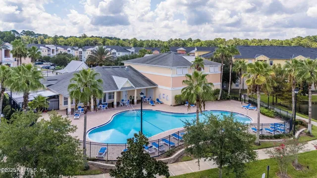 an aerial view of a house with a garden