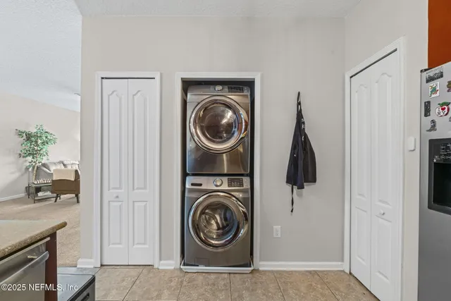 a view of washer and dryer in a utility room