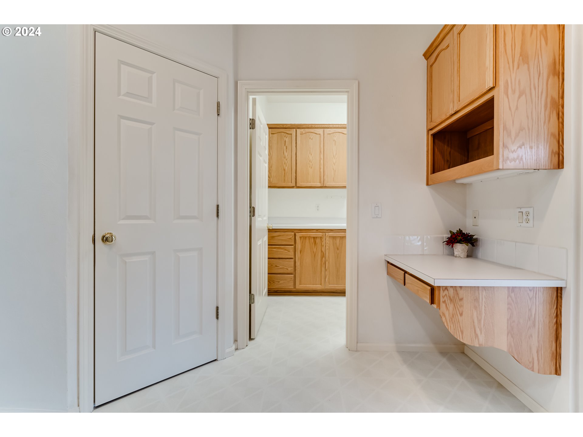 936 Old Orchard Lane Springfield, OR 97477 - Photo 17 of 35 a open kitchen with white cabinets and a sink