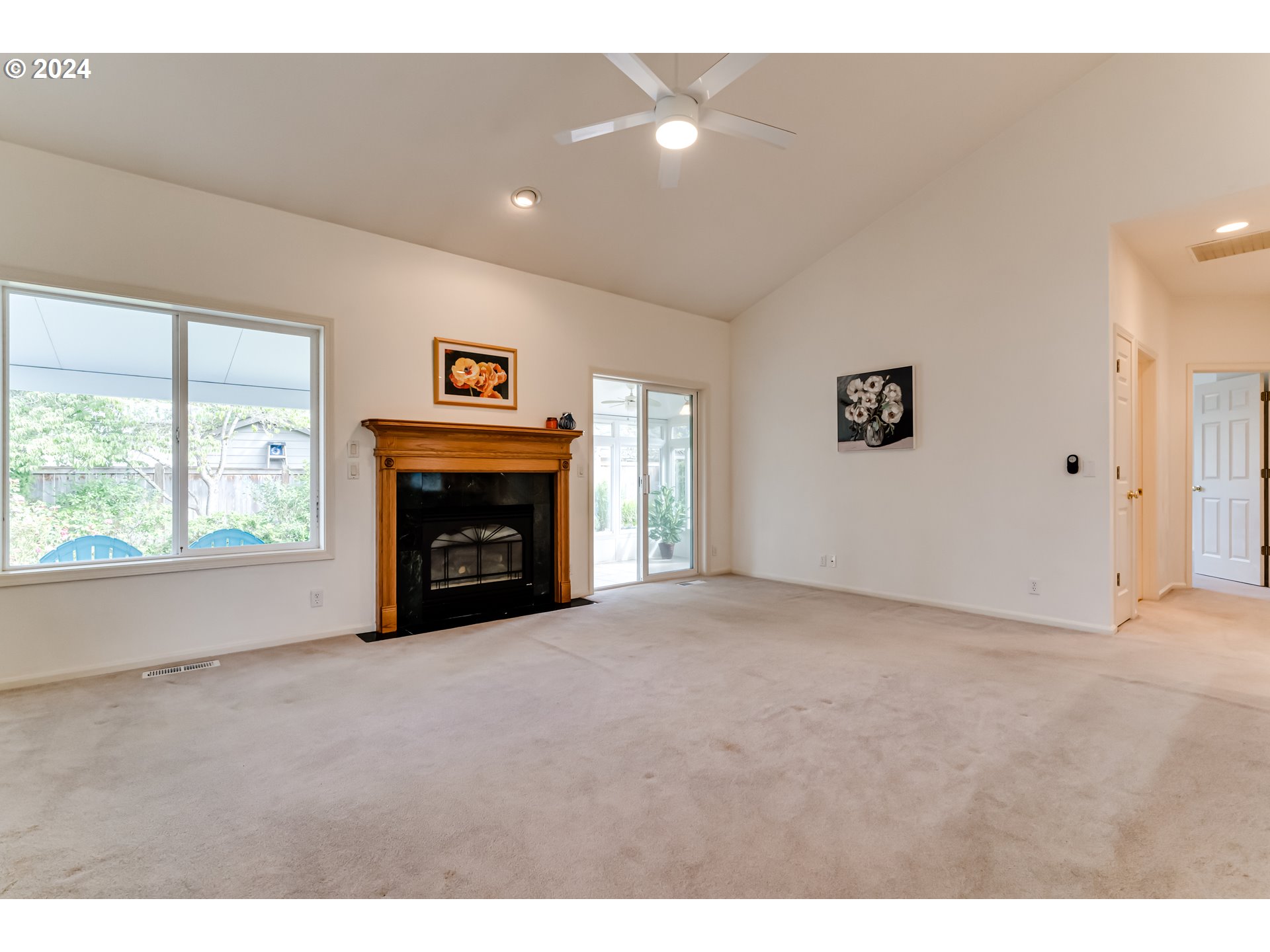 936 Old Orchard Lane Springfield, OR 97477 - Photo 21 of 35 a view of empty room with fireplace and window