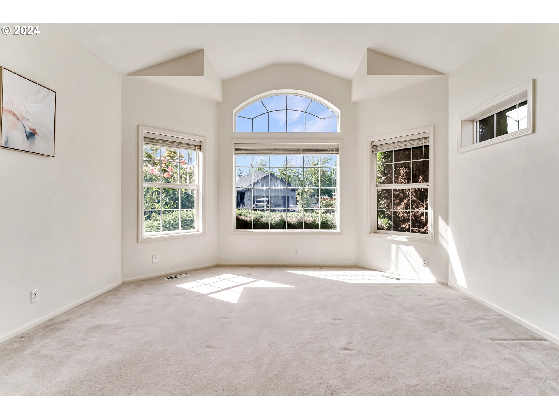 936 Old Orchard Lane Springfield, OR 97477 - Photo 5 of 35 a view of an empty room with windows
