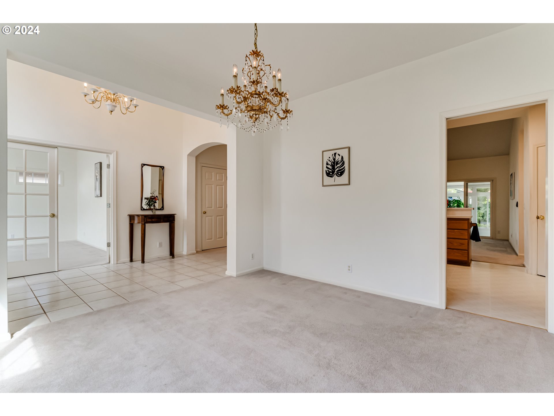 936 Old Orchard Lane Springfield, OR 97477 - Photo 7 of 35 a view of a big room with windows and chandelier