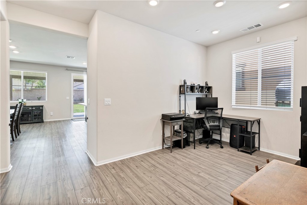 32942 Forgecroft Street Menifee, CA 92584 - Photo 7 of 44 a view of a livingroom with furniture and a window
