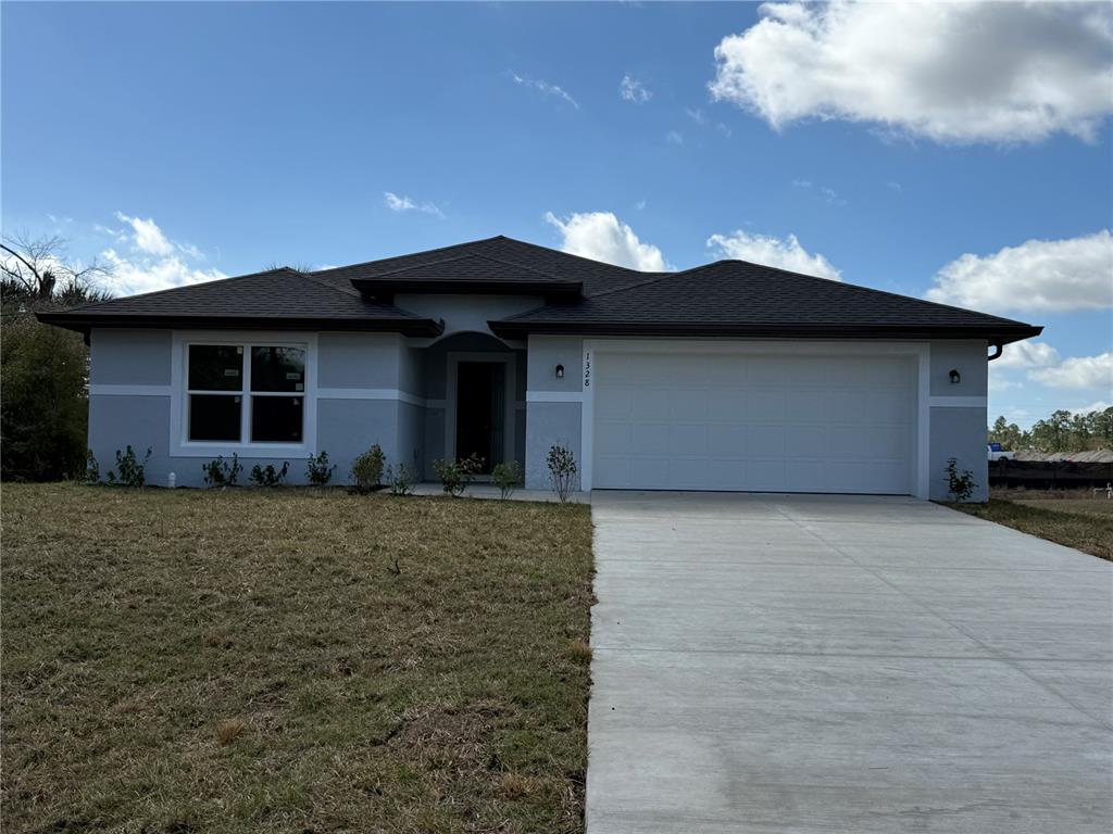 a front view of house with yard