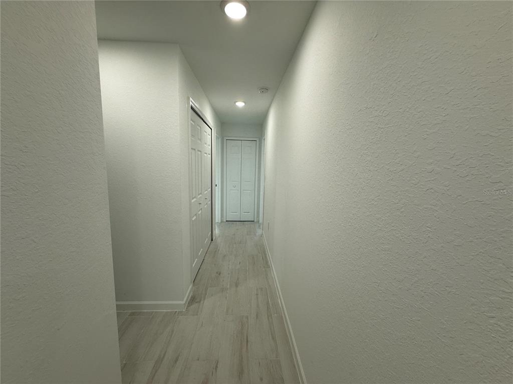 1328 Guttenburg Road North Port, FL 34288 - Photo 13 of 28 a view of hallway