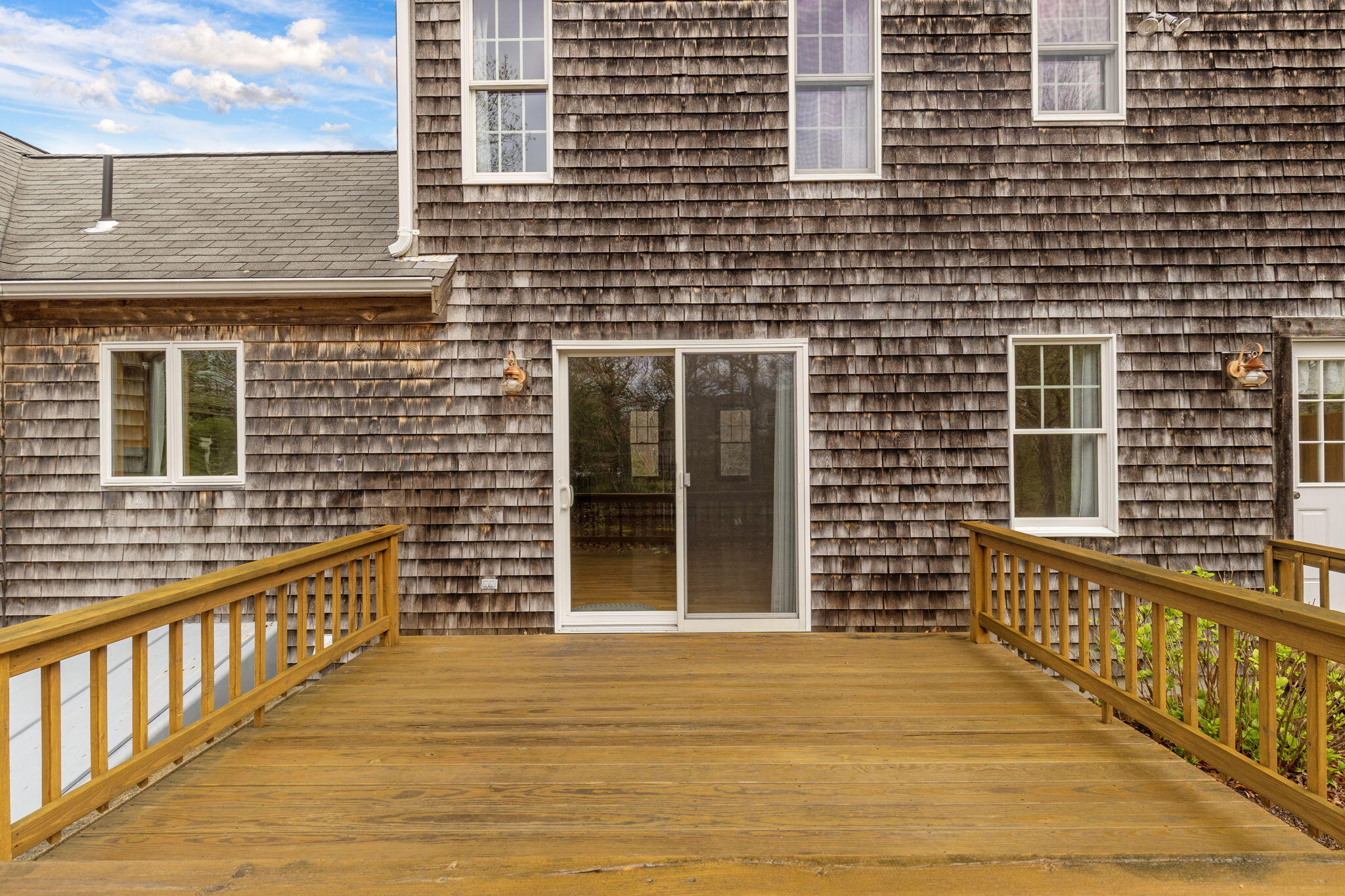 65 Whitney Road Eastham, MA 02642 - Photo 9 of 41 a view of front door of house with wooden floor
