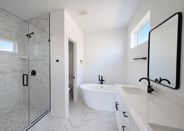 a view of an empty room and a window