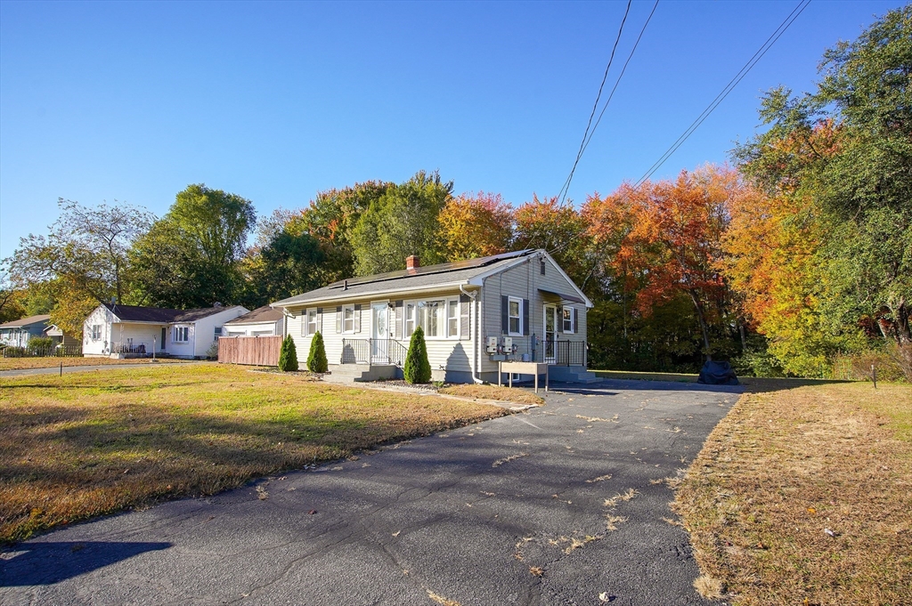 70 Gary Road Springfield, MA 01119 - Photo 17 of 20 a front view of a house with a yard