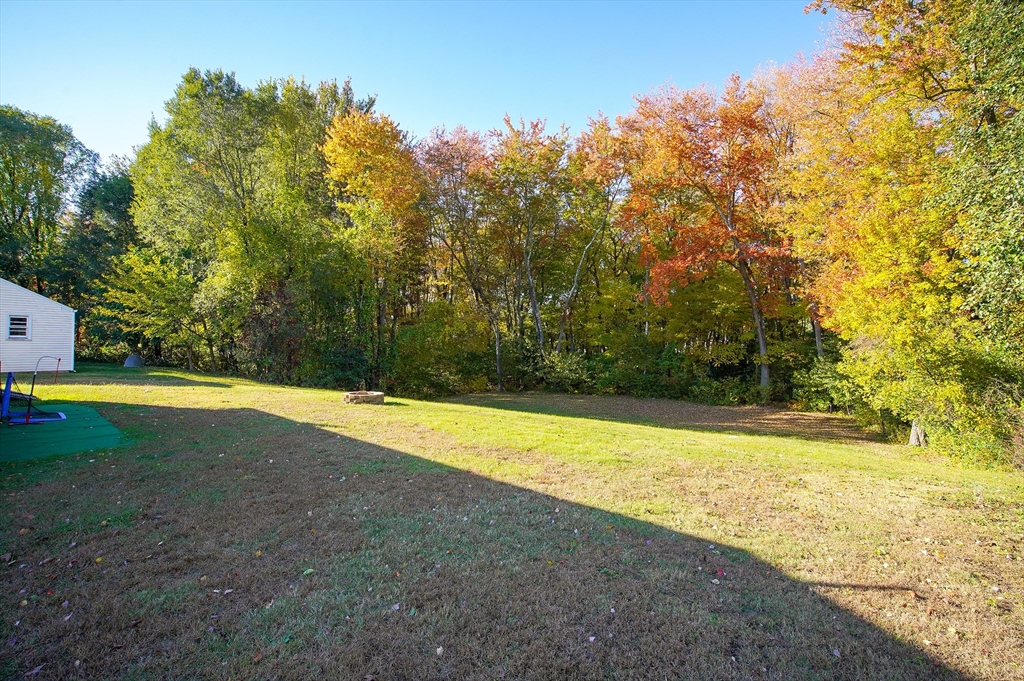 70 Gary Road Springfield, MA 01119 - Photo 18 of 20 a view of a swimming pool with an outdoor space and seating area
